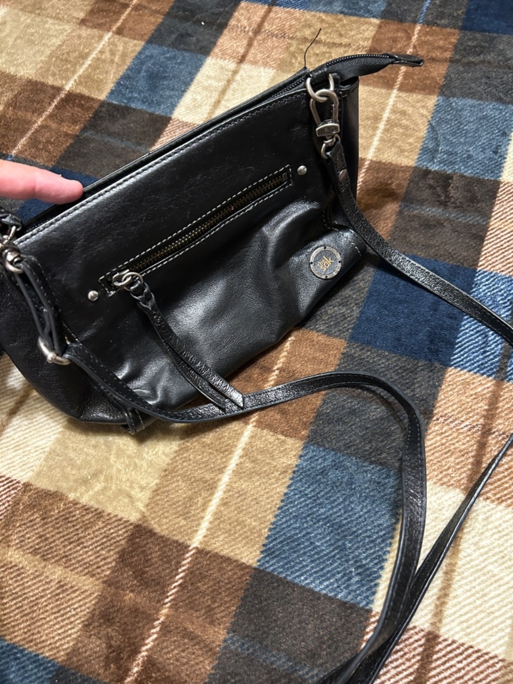 The Sak Black Leather Crossbody with Front Zip Accent